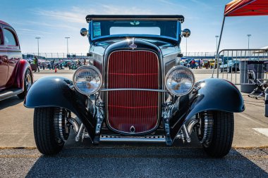Lebanon, TN - May 13, 2022: Low perspective front view of a 1932 Ford Model B Deluxe Cabriolet at a local car show.