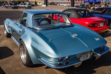 Lebanon, TN - May 13, 2022: High perspective back corner view of a 1964 Chevrolet Corvette Stingray Coupe at a local car show.