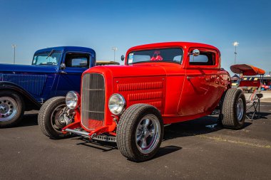 Lebanon, TN - May 13, 2022: Low perspective front corner view of a 1932 Ford 3 Window Highboy Coupe at a local car show.