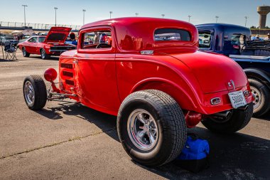 Lebanon, TN - May 13, 2022: Wide angle low perspective back corner view of a 1932 Ford 3 Window Highboy Coupe at a local car show.