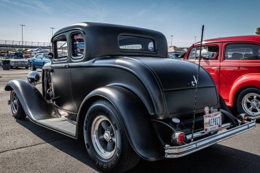 Lebanon, TN - May 13, 2022: Low perspective rear view of a 1932 Ford Model B 5 Window Coupe Hot Rodat a local car show.