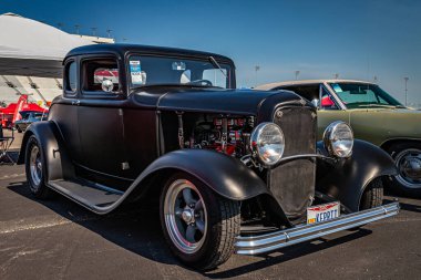 Lebanon, TN - May 13, 2022: Low perspective front corner view of a 1932 Ford Model B 5 Window Coupe Hot Rod at a local car show.