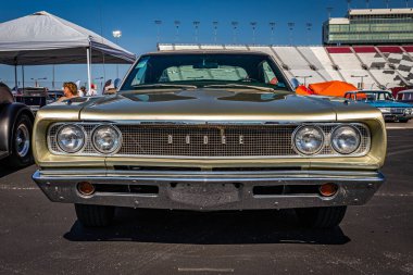 Lebanon, TN - May 13, 2022: Low perspective front view of a 1968 Dodge Coronet Super Bee convertible at a local car show.