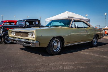 Lebanon, TN - May 13, 2022: Low perspective front corner view of a 1968 Dodge Coronet Super Bee convertible at a local car show.