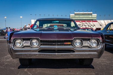 Lebanon, TN - May 13, 2022: Low perspective front view of a 1967 Oldsmobile Cutlass 442 Hardtop at a local car show.