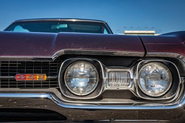 Lebanon, TN - May 13, 2022: Close up detail view of a 1967 Oldsmobile Cutlass 442 Hardtop headlights at a local car show.