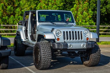 Pigeon Forge, TN - August 25, 2017: Modified Off Road Jeep Wrangler JK Sport Unlimited Soft Top at a local enthusiast rally.