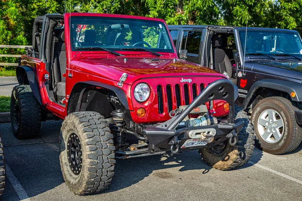 Pigeon Forge, TN - August 25, 2017: Modified Off Road Jeep Wrangler JK Sport Soft Top at a local enthusiast rally.