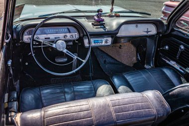 Lebanon, TN - May 13, 2022: High perspective front interior view of a 1964 Chevrolet Corvair Monza Convertible at a local car show.