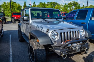 Pigeon Forge, TN - August 25, 2017: Modified Off Road Jeep Wrangler Sport JK Soft Top at a local enthusiast rally.