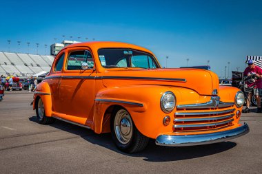 Lebanon, TN - May 13, 2022: Low perspective front corner view of a 1946 Ford Super Deluxe Coupe at a local car show.