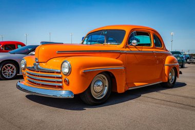 Lebanon, TN - May 13, 2022: Low perspective front corner view of a 1946 Ford Super Deluxe Coupe at a local car show.
