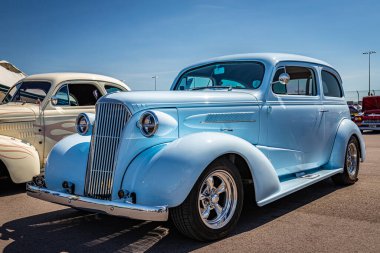 Lebanon, TN - May 13, 2022: Low perspective front corner view of a 1937 Chevrolet Master Deluxe 2 Door Town Sedan at a local car show.