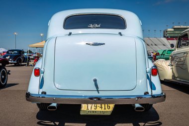 Lebanon, TN - May 13, 2022: Low perspective rear view of a 1937 Chevrolet Master Deluxe 2 Door Town Sedan at a local car show.