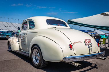 Lebanon, TN - May 13, 2022: Low perspective rear corner view of a 1940 Chevrolet Special Deluxe Coupe at a local car show.
