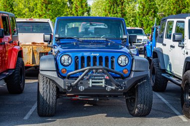 Pigeon Forge, TN - August 25, 2017: Modified Off Road Jeep Wrangler Sport JK Soft Top at a local enthusiast rally.