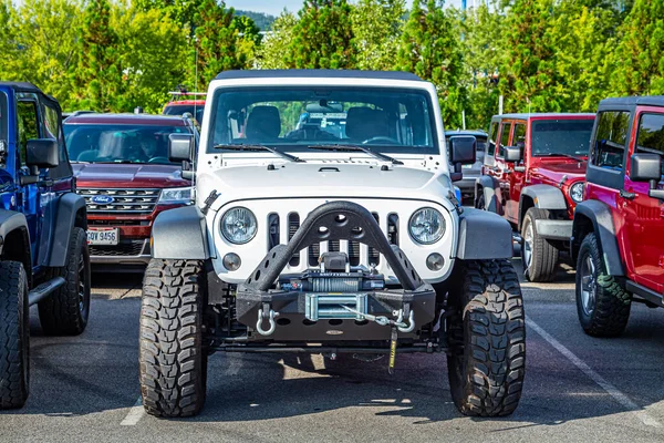 Pigeon Forge, TN - August 25, 2017: Modified Off Road Jeep Wrangler Sport JK Unlimited Soft Top at a local enthusiast rally.