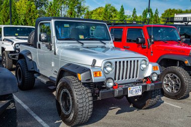 Pigeon Forge, TN - August 25, 2017: Modified Off Road Jeep Wrangler Sport Unlimited TJ Hardtop at a local enthusiast rally.