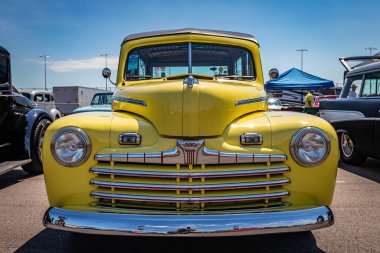 Lebanon, TN - May 13, 2022: Low perspective front view of a 1946 Ford Super Deluxe Woody Wagon at a local car show.