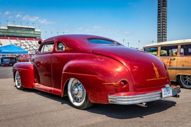 Lebanon, TN - May 13, 2022: Low perspective back corner view of a custom 1947 Ford 5 Window Coupe at a local car show.
