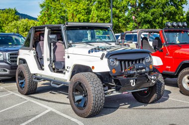 Pigeon Forge, TN - August 25, 2017: Modified Jeep Wrangler Sport X Unlimited JK Soft Top at a local enthusiast rally.