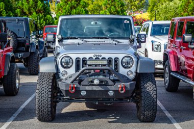 Pigeon Forge, TN - August 25, 2017: Modified Jeep Wrangler Sport Unlimited JK Hardtop at a local enthusiast rally.