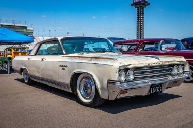 Lebanon, TN - May 13, 2022: Low perspective front corner view of a 1963 Oldsmobile 98 Luxury Sedan at a local car show.