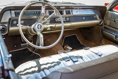 Lebanon, TN - May 13, 2022: Low angle close up interior view of a 1963 Oldsmobile 98 Luxury Sedan at a local car show.