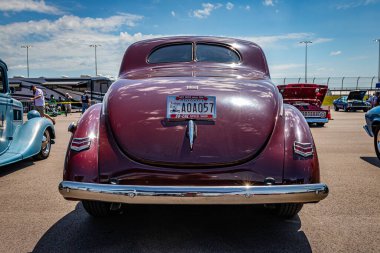 Lebanon, TN - May 13, 2022: Low perspective rear view of a 1940 Ford Deluxe Flathead V8 Coupe at a local car show.