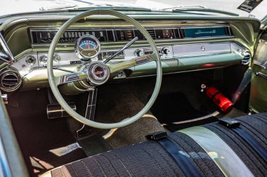Lebanon, TN - May 13, 2022: Close up detailed  interior view of a 1964 Oldsmobile Dynamic 88 Holiday Coupe at a local car show.