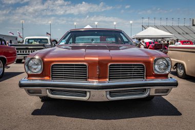 Lebanon, TN - May 13, 2022: Low perspective front view of a 1974 Oldsmobile Cutlass Salon 2 Door Sedan at a local car show.