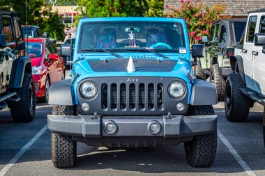 Pigeon Forge, TN - August 25, 2017: Modified Jeep Wrangler Sport Unlimited JK Soft Top at a local enthusiast rally.