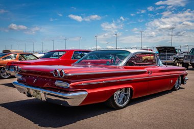 Lebanon, TN - May 13, 2022: Low perspective rear corner view of a 1960 Pontiac Parisienne Hardtop Coupe at a local car show.