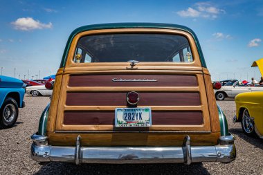 Lebanon, TN - May 13, 2022: Low perspective rear view of a 1952 Chevrolet Deluxe Tin Woody Wagon at a local car show.