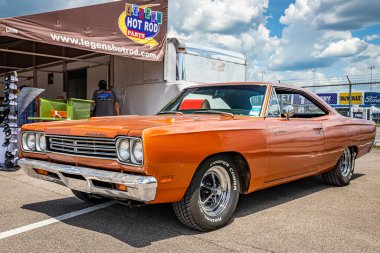 Lebanon, TN - May 13, 2022: Low perspective front corner view of a 1969 Plymouth Roadrunner 383 Hardtop Coupe at a local car show.