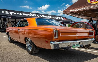 Lebanon, TN - May 13, 2022: Low perspective rear corner view of a 1969 Plymouth Roadrunner 383 Hardtop Coupe at a local car show.