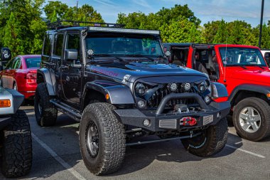 Pigeon Forge, TN - August 25, 2017: Modified Jeep Wrangler Rubicon Unlimited JK Hardtop at a local enthusiast rally.