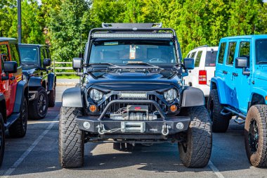 Pigeon Forge, TN - August 25, 2017: Modified Jeep Wrangler Sport Unlimited JK Soft Top at a local enthusiast rally.