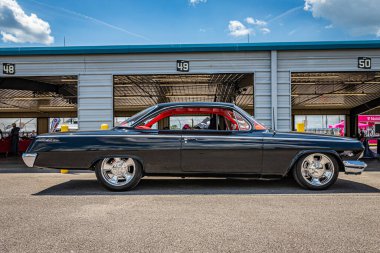 Lebanon, TN - May 13, 2022: Wide angle low perspective side view of a 1962 Chevrolet BelAir Bubble Top at a local car show.