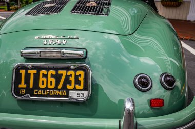 Highlands, NC - June 10, 2022: High perspective detail view of a 1953 Porsche 356 America Roadster Convertible rear at a local car show.