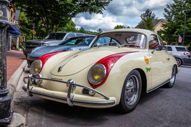 Highlands, NC - June 10, 2022: Low perspective front corner view of a 1958 Porsche 356A 1600 Super Coupe at a local car show.