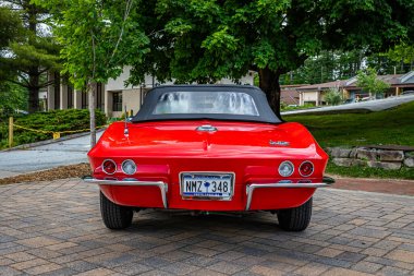Highlands, NC - June 10, 2022: Low perspective rear view of a 1966 Chevrolet Corvette Stingray Convertible at a local car show.