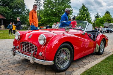 Highlands, NC - June 10, 2022: Low perspective front corner view of a 1957 Triumph TR3 Cabriolet at a local car show.