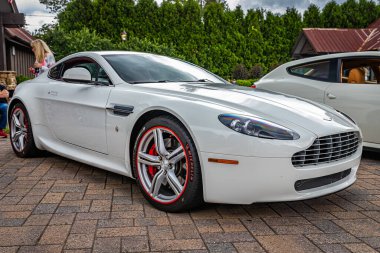 Highlands, NC - June 10, 2022: Low perspective front corner view of a 2011 Aston Martin V8 Vantage N420 Hardtop Coupe at a local car show.