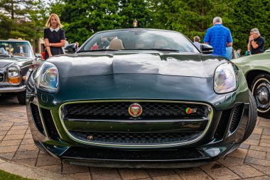 Highlands, NC - June 10, 2022: Low perspective front view of a 2014 Jaguar F-Type V8 S Convertible at a local car show.
