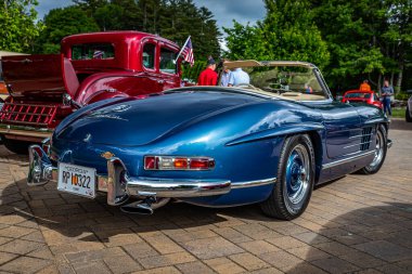 Highlands, NC - June 10, 2022: Low perspective rear corner view of a 1958 Mercedes-Benz 300 SL Roadster at a local car show.