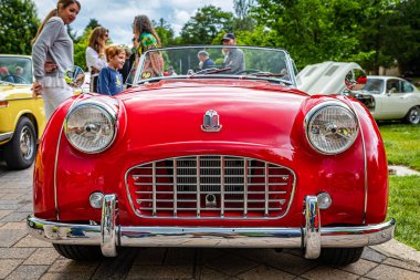 Highlands, NC - June 10, 2022: Low perspective front view of a 1957 Triumph TR3 Cabriolet at a local car show.
