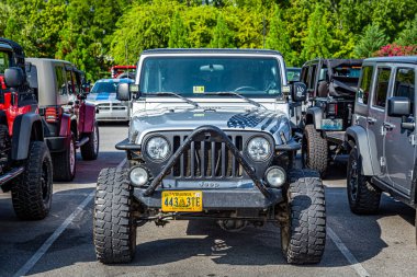 Pigeon Forge, TN - August 25, 2017: Modified Jeep Wrangler Sport TJ Hardtop at a local enthusiast rally.