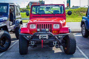 Pigeon Forge, TN - August 25, 2017: Modified Jeep Wrangler Sport YJ Soft Top at a local enthusiast rally.
