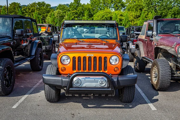 Pigeon Forge, TN - August 25, 2017: Modified Jeep Wrangler Sport JK Soft Top at a local enthusiast rally.